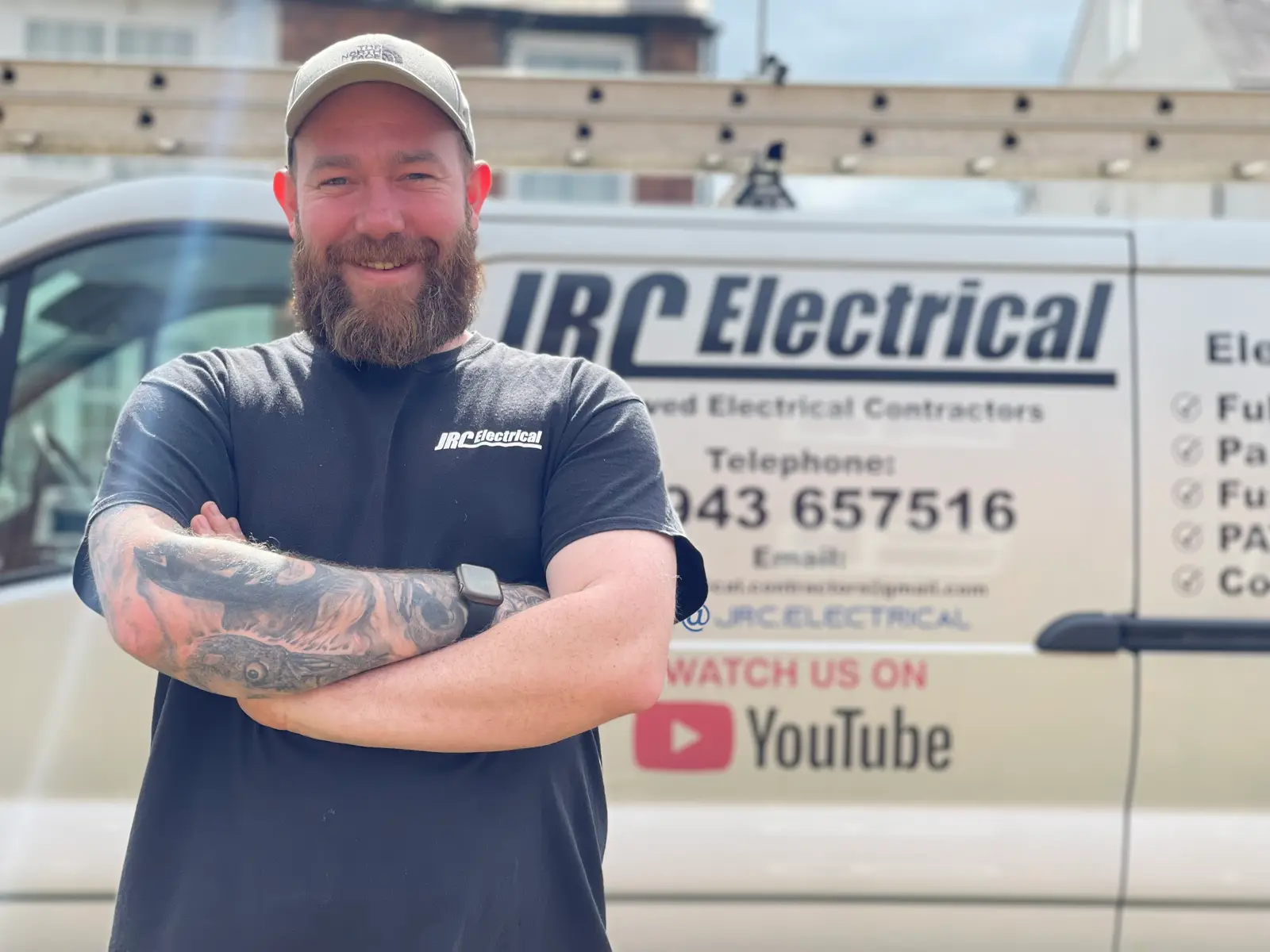 Jack Cutler of JRC Electrical in front of the JRC Electrical van